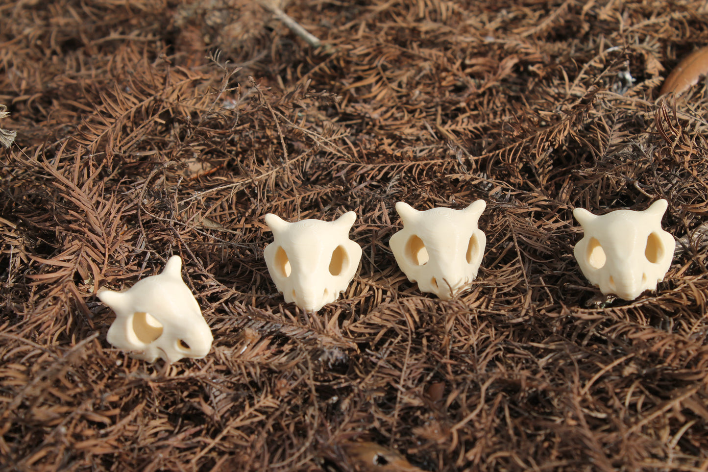 BoneHead Helmet | CosmicMon Keychain |